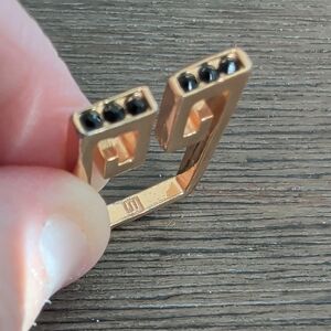 LS Tagged Gold and Black Geometric Ring